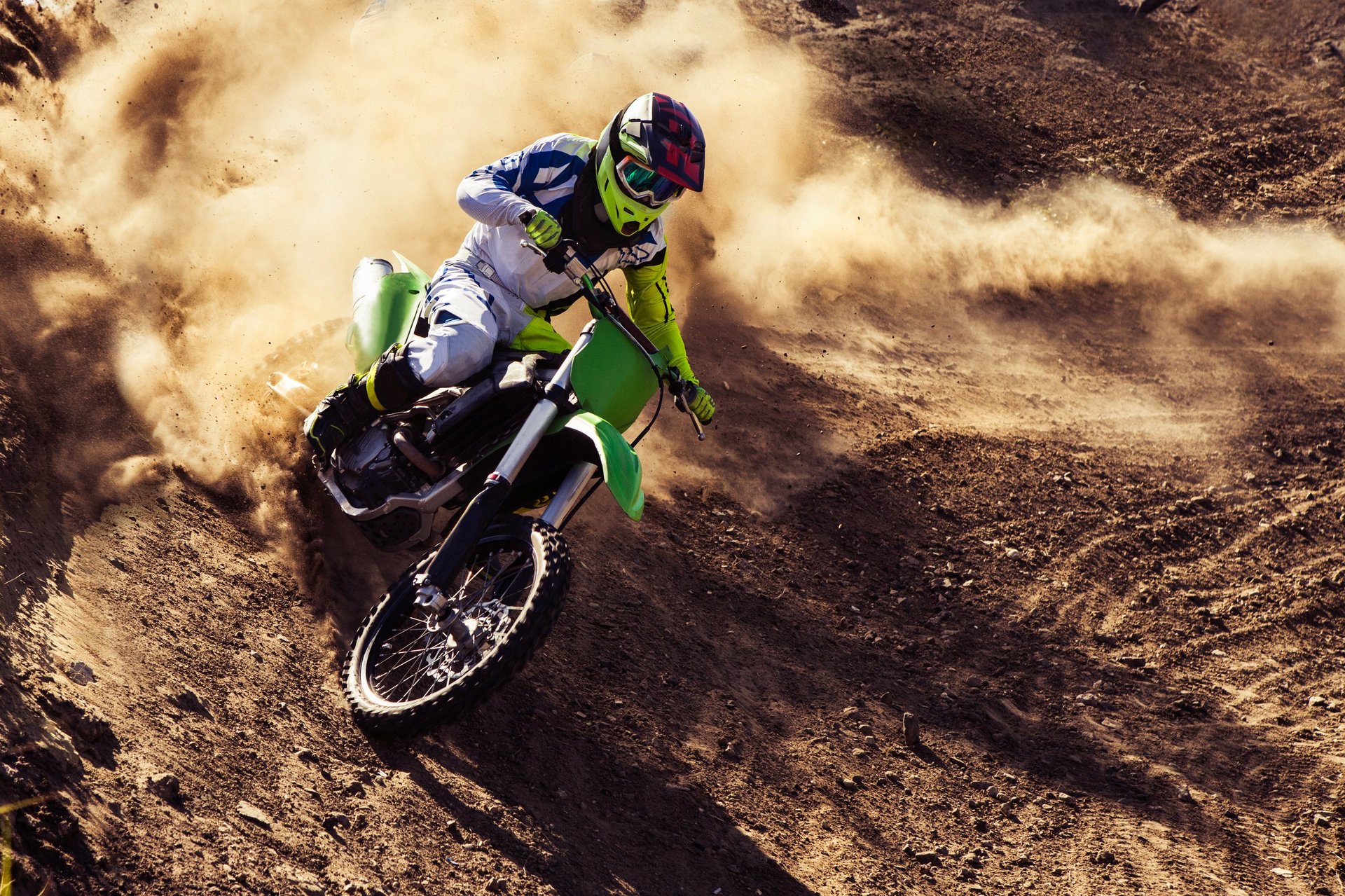 Motocross rider dust cloud